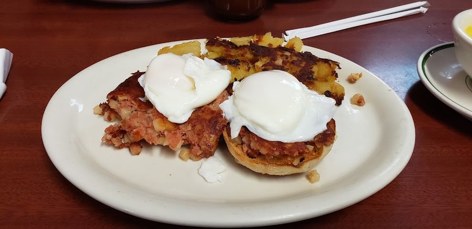 English Muffin with Cornhash over Easy Eggs